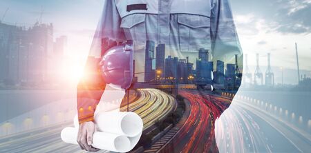 Future building construction engineering project concept with double exposure graphic design. Building engineer, architect people or construction worker working with modern civil equipment technology.の写真素材