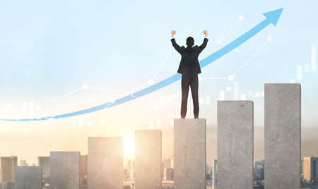 Double Exposure Image of Business and Finance - Businessman with report chart up forward to financial profit growth of stock market investment.の写真素材