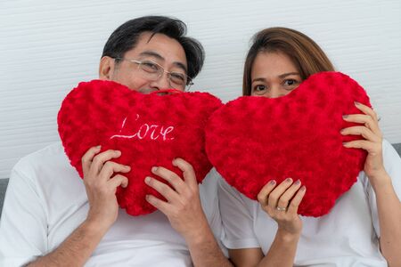 Happy Asian senior couple having good time at home. Old people retirement and healthy citizens elderly concept.の写真素材