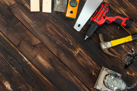 Top view flat lay of tools for handyman and carpenter. Woodwork hobby and DIY concept.