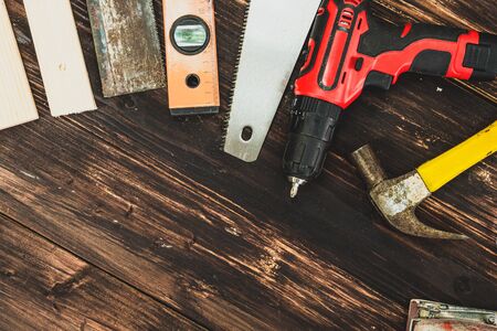 Top view flat lay of tools for handyman and carpenter. Woodwork hobby and DIY concept.の写真素材