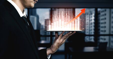 Double Exposure Image of Business and Finance - Businessman with report chart up forward to financial profit growth of stock market investment.の写真素材
