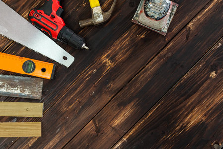 Top view flat lay of tools for handyman and carpenter. Woodwork hobby and DIY concept.