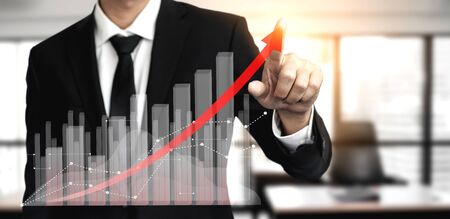 Double Exposure Image of Business and Finance - Businessman with report chart up forward to financial profit growth of stock market investment.の写真素材
