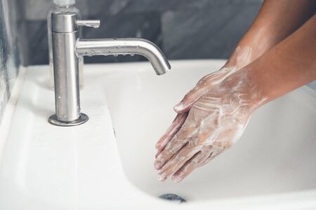 Hands washing for prevention of virusの写真素材