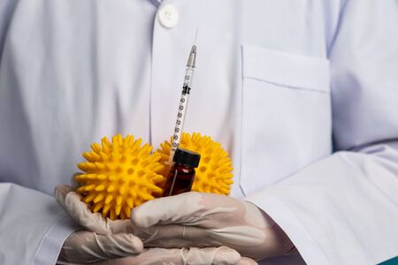 Coronavirus COVID-19 medical test vaccine research and development concept. Scientist in laboratory study and analyze scientific sample of Coronavirus antibody to produce drug treatment for COVID-19.の写真素材