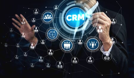 CRM Customer Relationship Management for business sales marketing system concept presented in futuristic graphic interface of service application to support CRM database analysis.の写真素材
