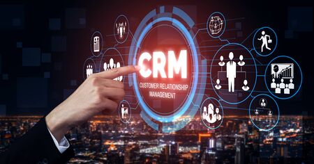 CRM Customer Relationship Management for business sales marketing system concept presented in futuristic graphic interface of service application to support CRM database analysis.の写真素材