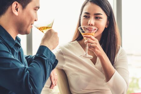 Happy romantic couple eating lunch at restaurant . Couple anniversary celebration and lifestyle .の写真素材