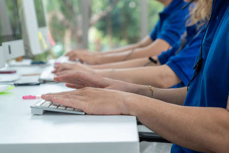 Close up shot of business people hand typing and workingの写真素材
