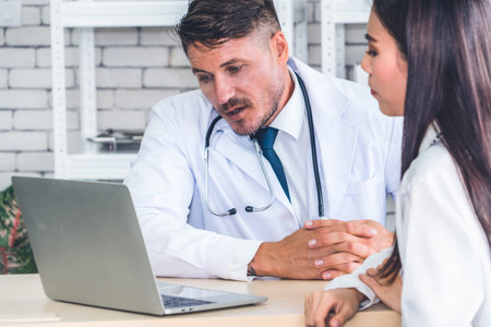 Doctor in professional uniform examining patient at hospital