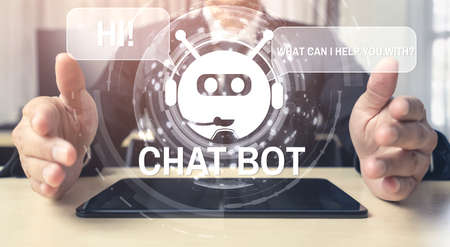 AI Chatbot smart digital customer service application concept. Computer or mobile device application using artificial intelligence chat bot automatic reply online message to help customers instantly.の写真素材