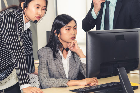 Business people wearing headset working in office