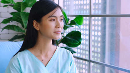 Happy patient getting well improvement at hospital ward . Health care, medical and good hospital service concept.の写真素材