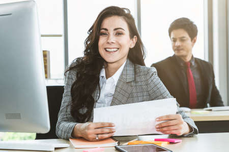 Business people working at table in modern office room while analyzing financial data report .の写真素材