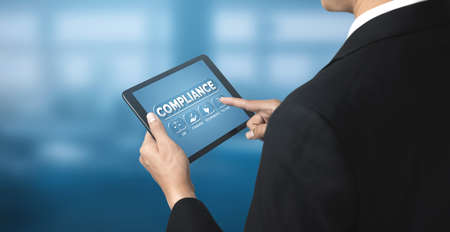 Compliance rule law and regulation graphic interface for business quality policy planning to meet international standard.の写真素材