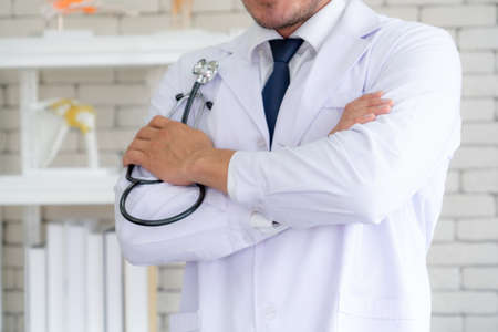 Doctor in professional uniform working at hospital . Medical healthcare and doctor service concept.の写真素材