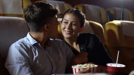 People audience watching movie in the movie theater cinema. Group recreation activity and entertainment concept.の写真素材