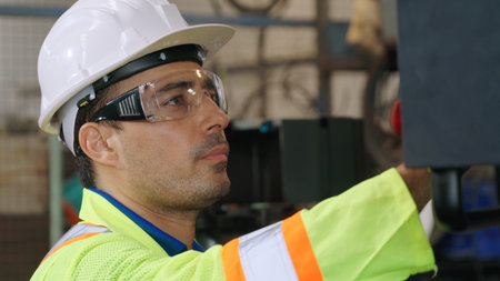 Smart factory worker using machine in factory workshop . Industry and engineering concept.