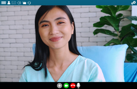 Patient talking on video call for telemedicine service . Online health care application in view of computer screen . Medical technology concept .の写真素材