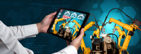 Engineer controls robotic arms by augmented reality industry technology application software. Smart...