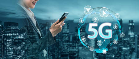 Advanced communication and global internet network connection in smart city . Concept of future 5G wireless digital connecting and social media networking .の写真素材