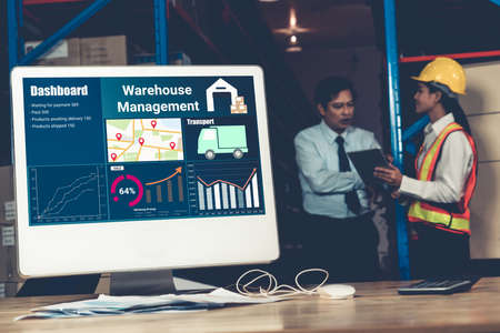 Warehouse management software application in computer for real time monitoring of goods package delivery . PC screen showing smart inventory dashboard for storage and supply chain distribution .の写真素材