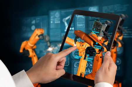 Engineer controls robotic arms by augmented reality industry technology application software. Smart...
