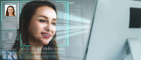 Facial recognition technology scan and detect people face for identification . Future concept interface showing digital biometric security system that analyze human face to verify personal data .の写真素材