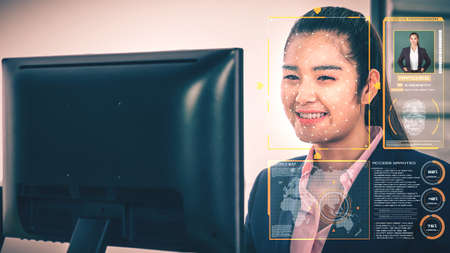 Facial recognition technology scan and detect people face for identification . Future concept interface showing digital biometric security system that analyze human face to verify personal data .の写真素材