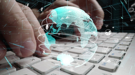 Man working on computer with graphic of business data analytic modernization showing concept of...