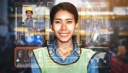 Facial recognition technology for industry worker to access machine control . Future concept interface showing digital biometric security system that analyze human face to verify personal data .の写真素材