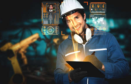 Facial recognition technology for industry worker to access machine control . Future concept interface showing digital biometric security system that analyze human face to verify personal data .の写真素材