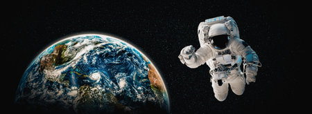 Astronaut spaceman do spacewalk while working for space station in outer space . Astronaut wear full...