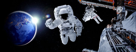 Astronaut spaceman do spacewalk while working for space station in outer space . Astronaut wear full...