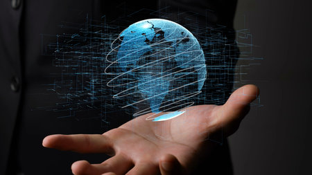 Human hand holding earth globe holographic technology . Futuristic visualization for virtual reality...