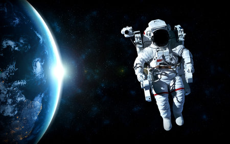 Astronaut spaceman do spacewalk while working for space station in outer space . Astronaut wear full...