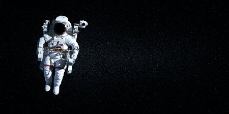 Astronaut spaceman do spacewalk while working for space station in outer space . Astronaut wear full spacesuit for space operation .の写真素材