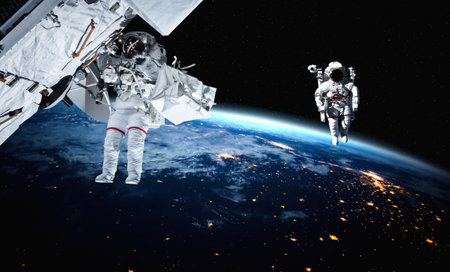 Astronaut spaceman do spacewalk while working for space station in outer space . Astronaut wear full...
