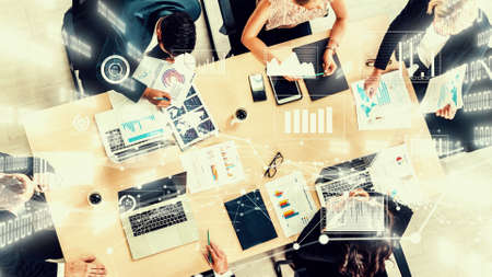 Creative visual of business people in corporate staff meeting . Concept of digital technology for marketing data analysis and investment decision making .の写真素材