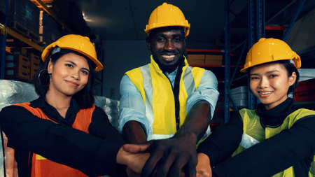 Portrait of happy warehouse worker in the storehouse . Logistics , supply chain and warehouse business concept .の写真素材