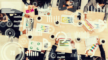 Creative visual of business people in corporate staff meeting . Concept of digital technology for marketing data analysis and investment decision making .の写真素材