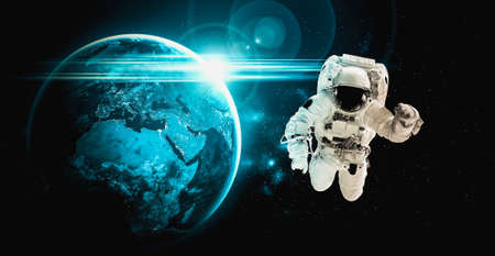 Astronaut spaceman do spacewalk while working for space station in outer space . Astronaut wear full spacesuit for space operation . Elements of this image furnished by  space astronaut photos.の写真素材