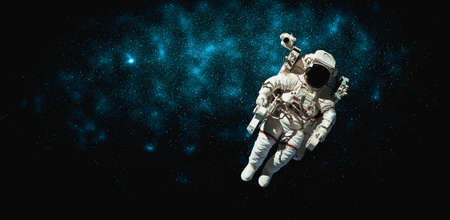 Astronaut spaceman do spacewalk while working for space station in outer space . Astronaut wear full spacesuit for space operation . Elements of this image furnished by  space astronaut photos.の写真素材