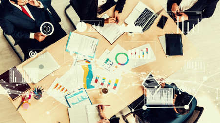 Creative visual of business people in corporate staff meeting . Concept of digital technology for marketing data analysis and investment decision making .の写真素材