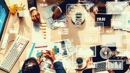 Creative visual of business people in corporate staff meeting . Concept of digital technology for marketing data analysis and investment decision making .の写真素材