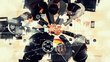 Creative visual of business people in the corporate staff meeting . Concept of digital technology for marketing data analysis and investment decision making .の写真素材