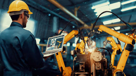 Smart industry robot arms modernization for digital factory technology . Concept of automation manufacturing process of Industry 4.0 or 4th industrial revolution and IOT software control operation .の写真素材
