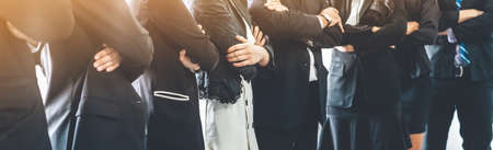 Many business people meeting standing in row with arms crossed and confident. Company organization employee unity and support. Concept of corporate partnership and human resources growth management.の写真素材