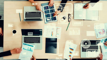 Creative visual of business people in corporate staff meeting . Concept of digital technology for marketing data analysis and investment decision making .の写真素材